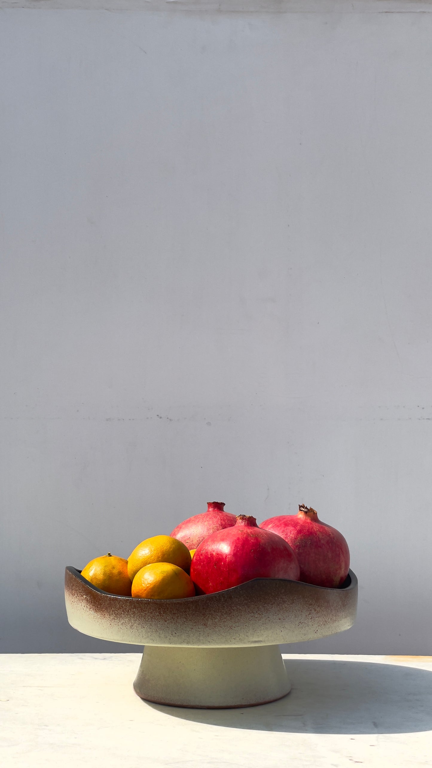Earthy cake and fruits plate