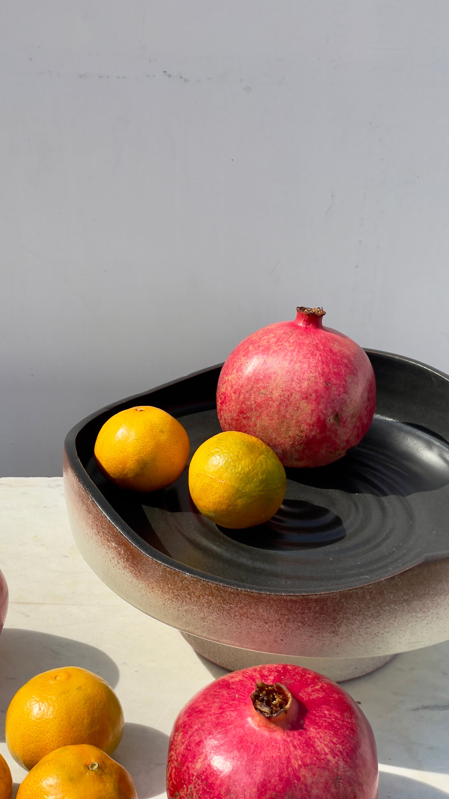 Earthy cake and fruits plate