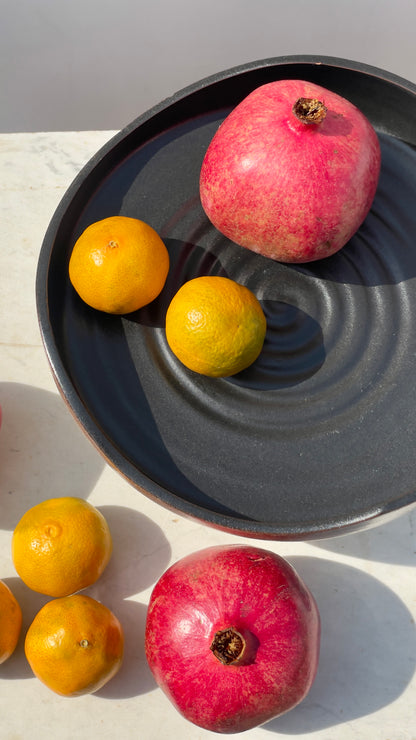 Earthy cake and fruits plate