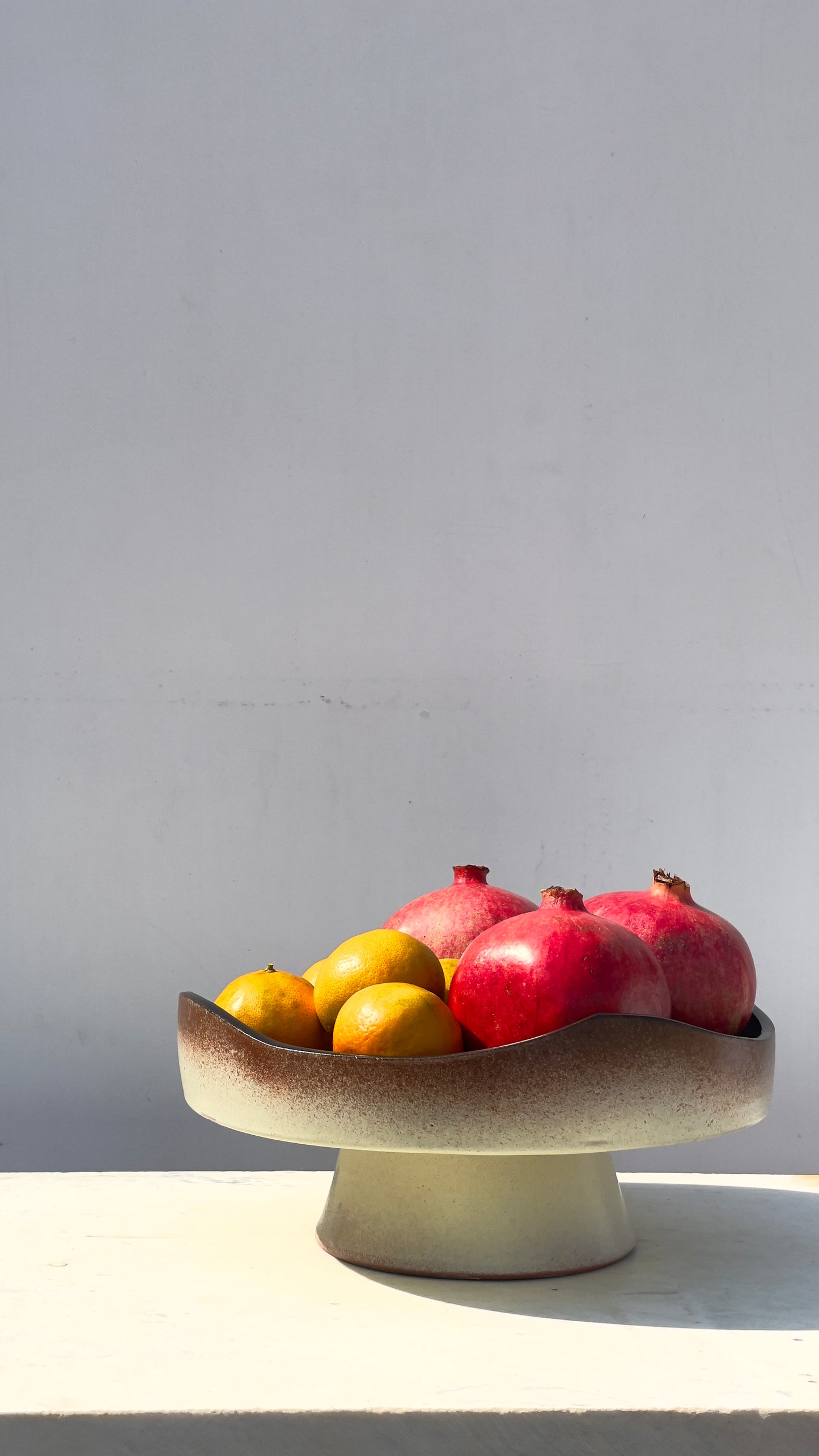 Earthy cake and fruits plate