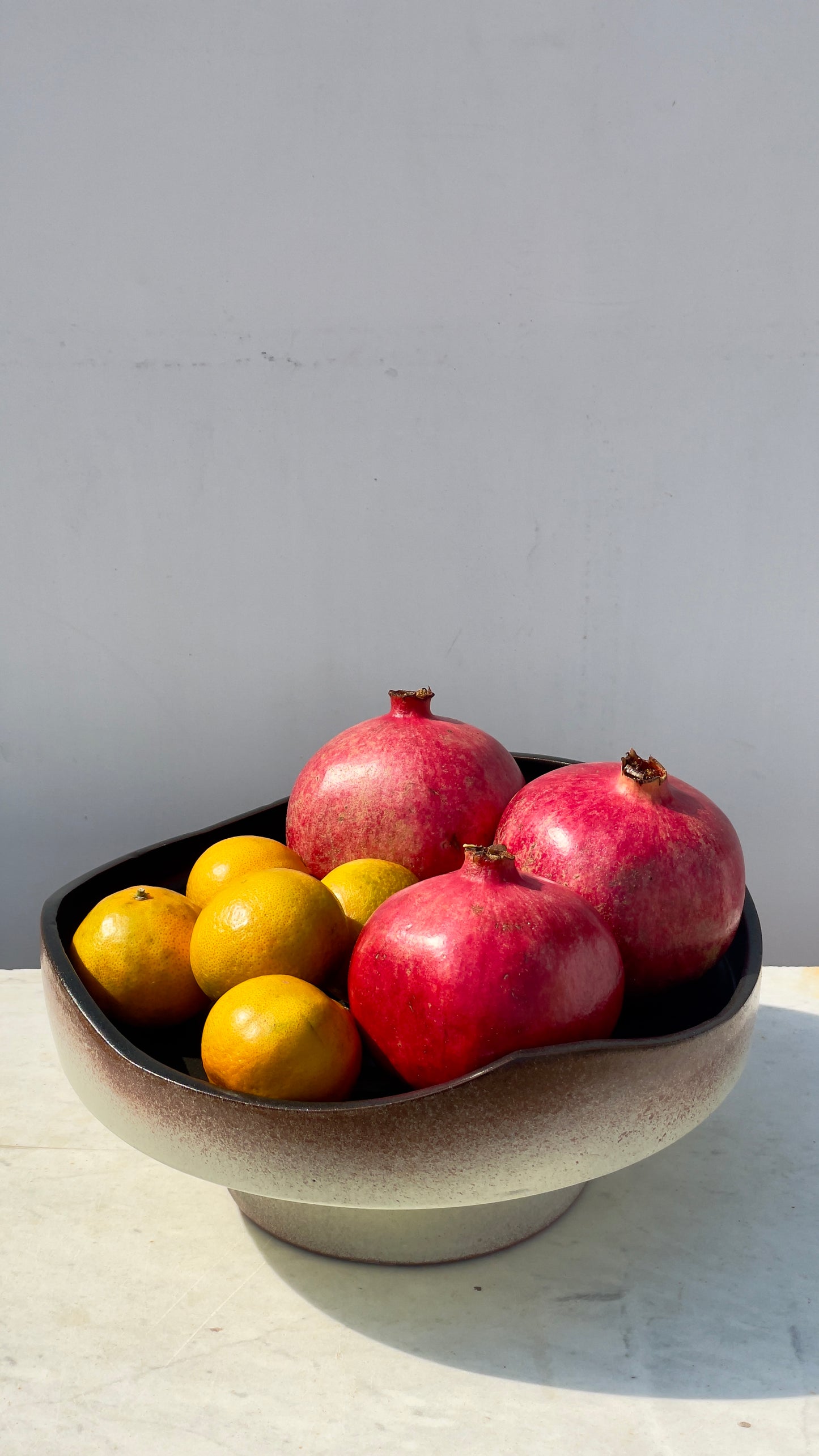 Earthy cake and fruits plate