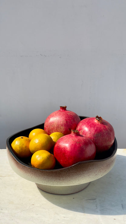 Earthy cake and fruits plate