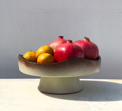 Earthy cake and fruits plate