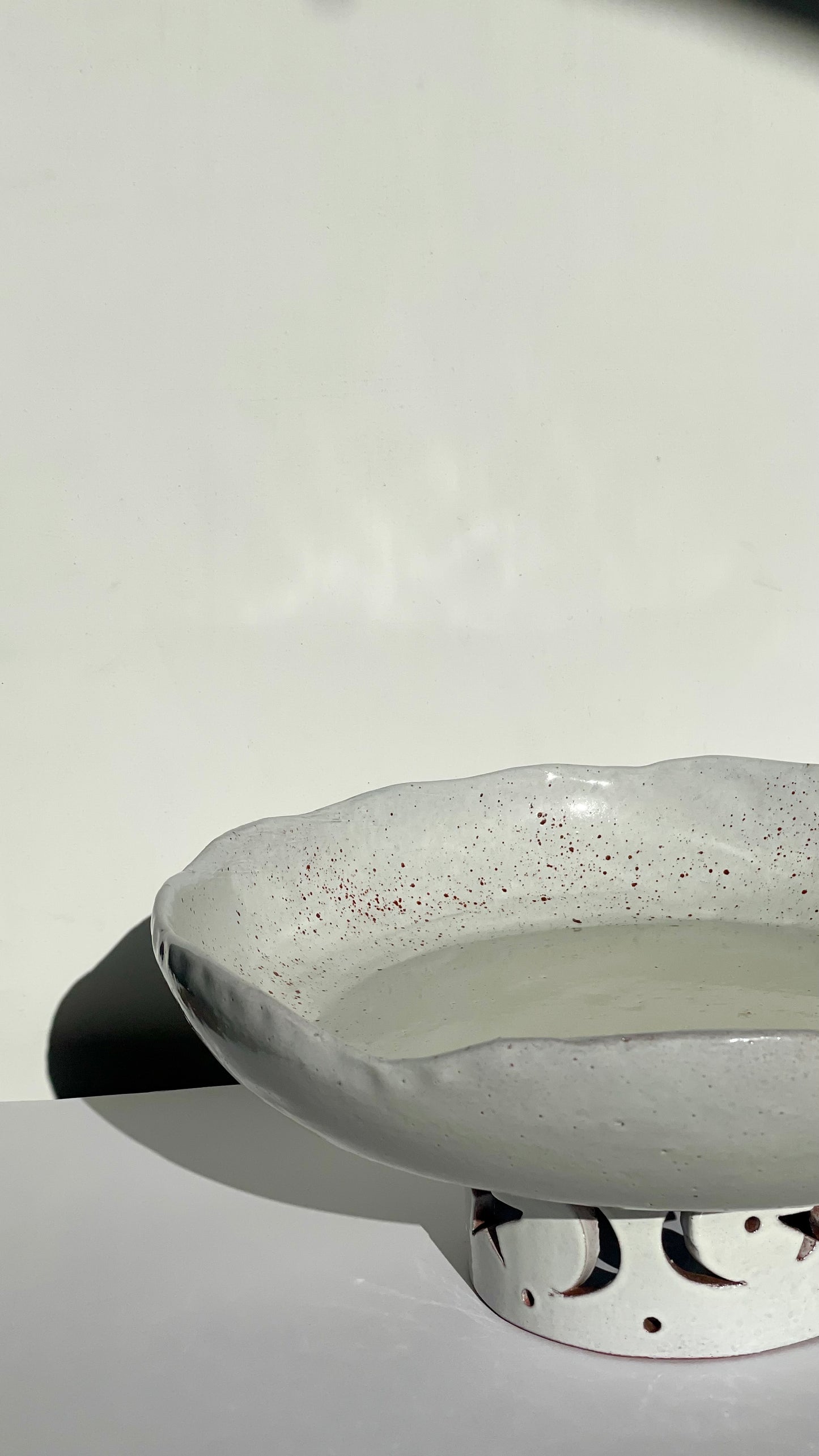 The crescent pedestal bowl.