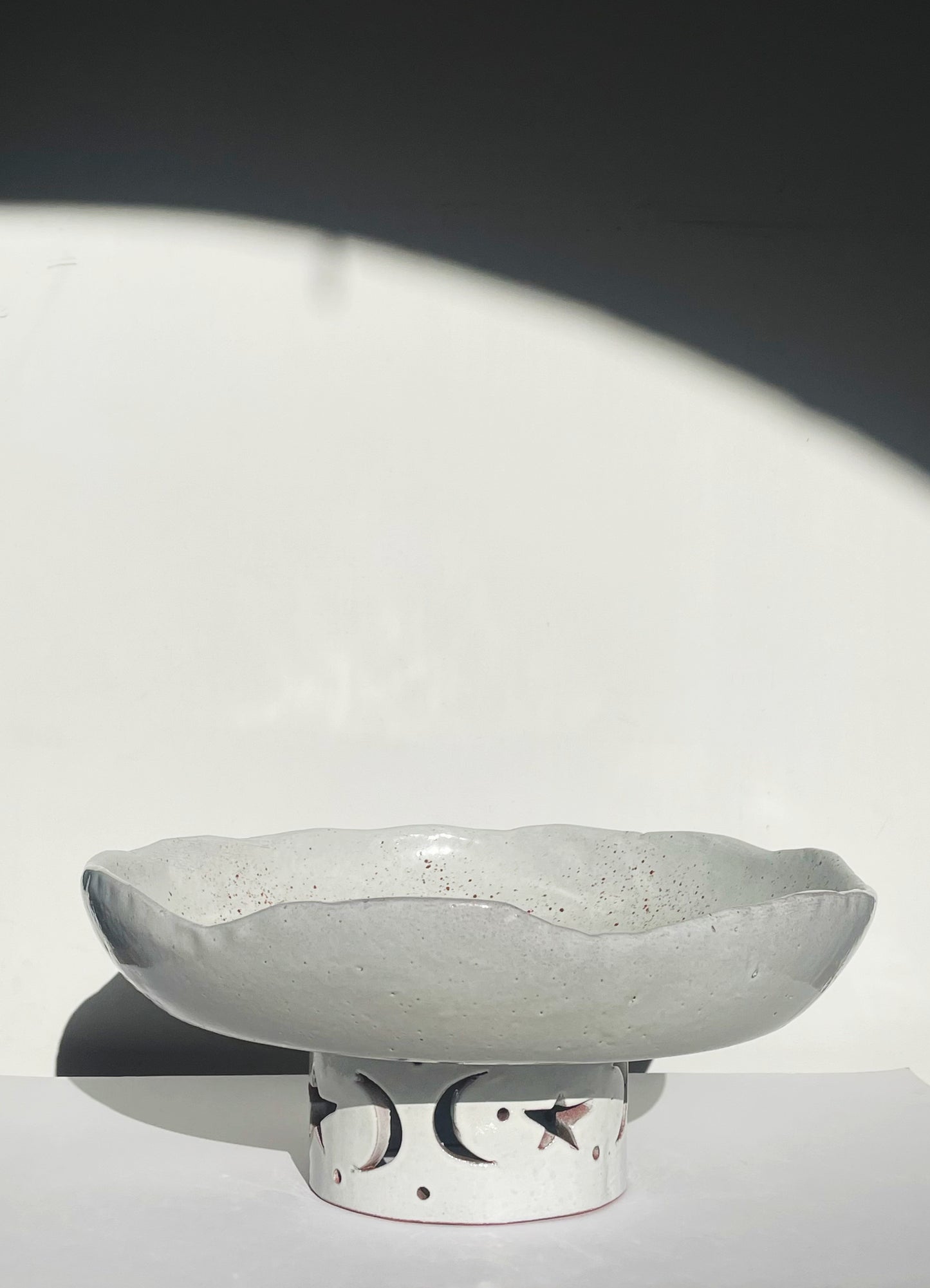 The crescent pedestal bowl.