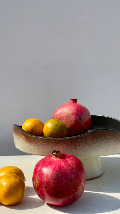 Earthy cake and fruits plate
