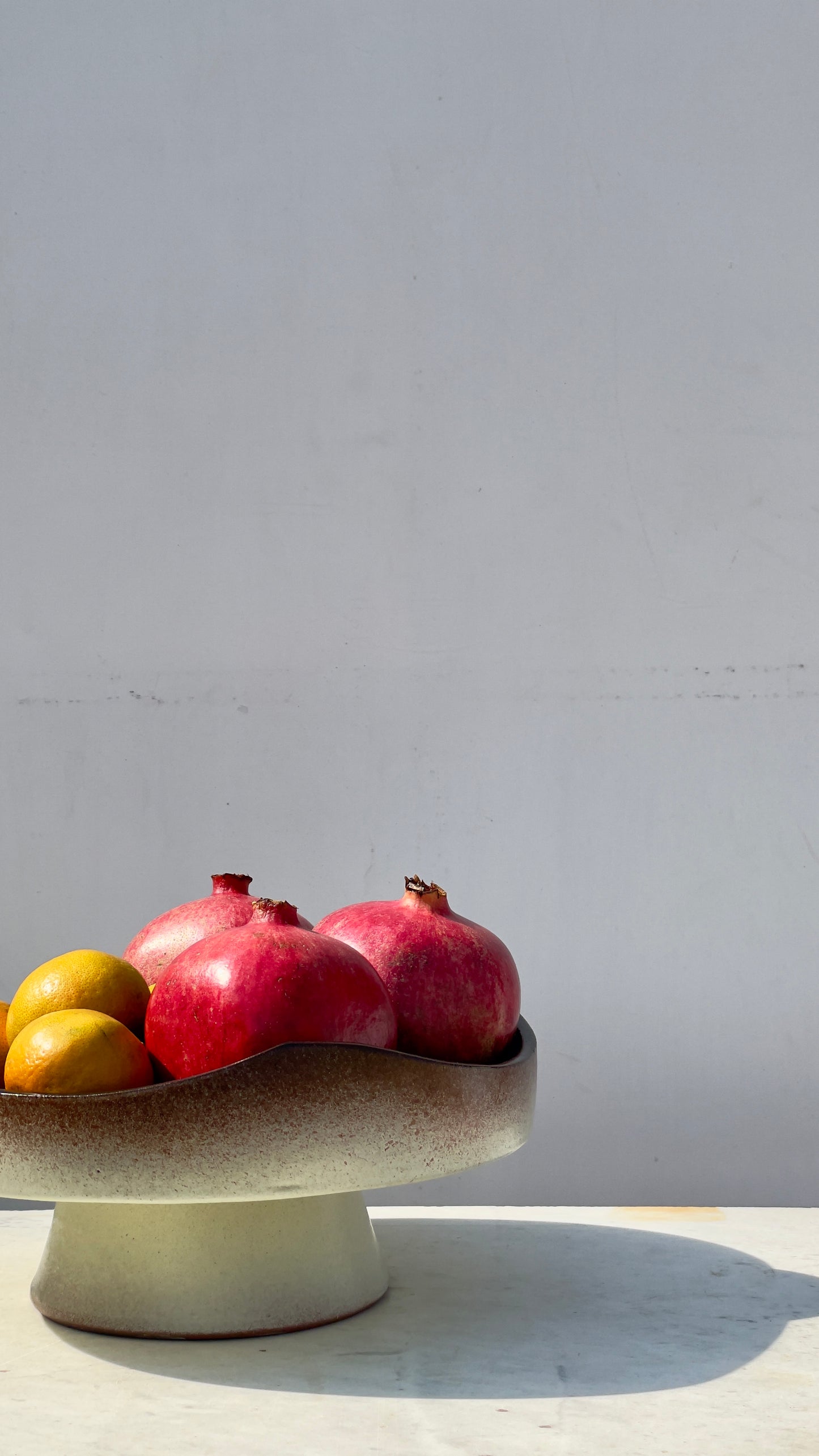 Earthy cake and fruits plate