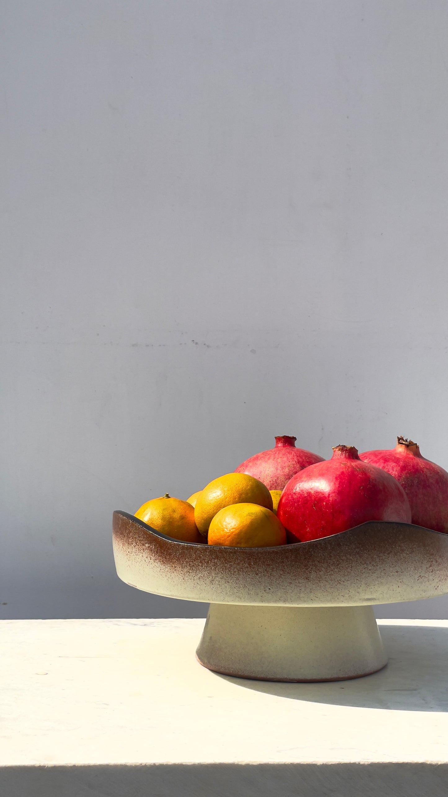 Earthy cake and fruits plate